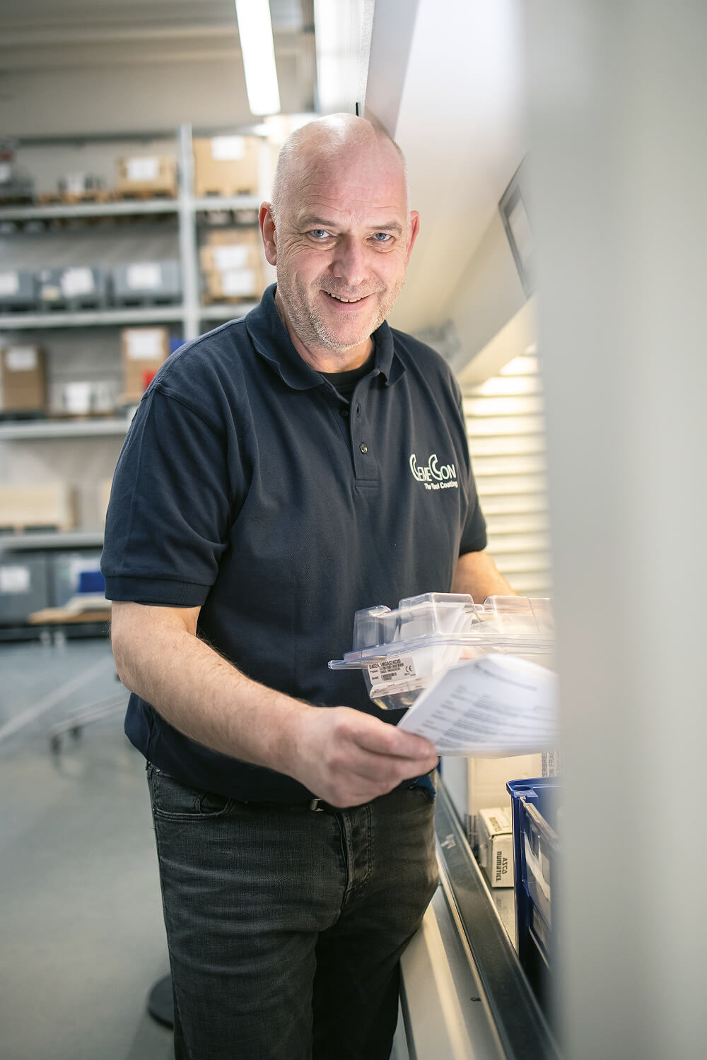 CemeCon employee preparing spare parts for shipment