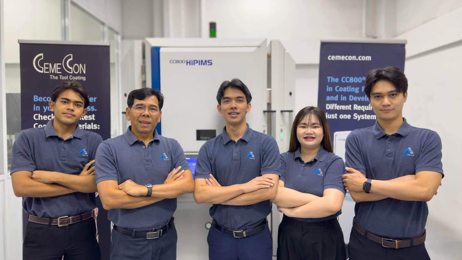 W.P.P. Engineering Co., Ltd. team, CemeCon partner, in front of a HiPIMS coating system